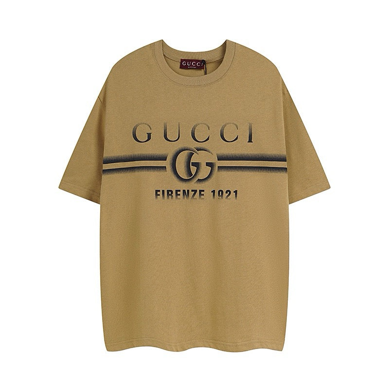 Tan Gucci short-sleeve T-shirt with bold logo print and striped stripe graphic