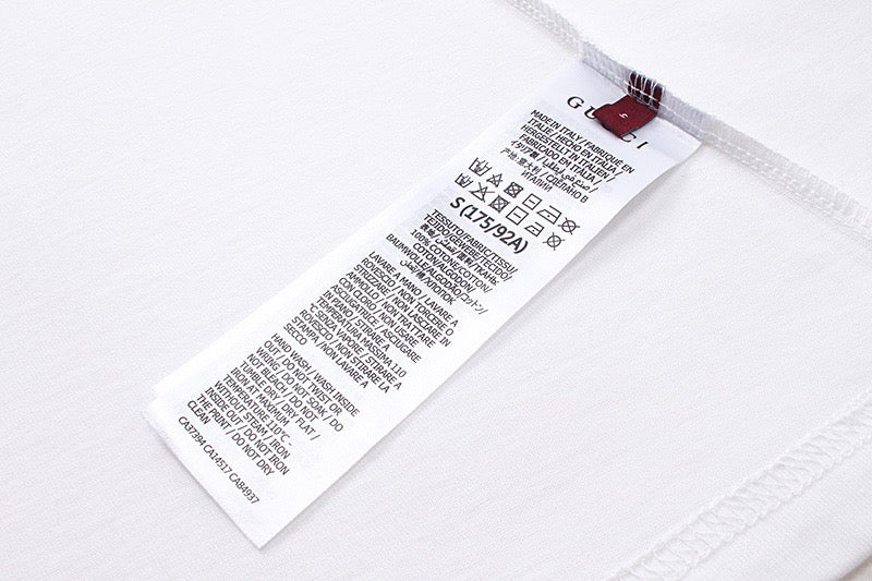White T-shirt with interior care label and barcode tag