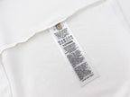 White T-shirt with inner care label near neckline