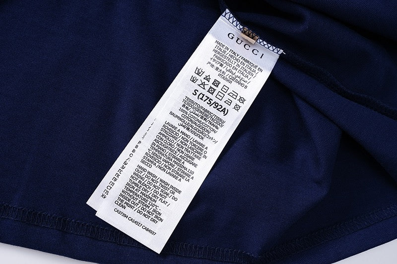 Navy T-shirt with interior care label at back seam