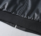Black leather jacket ribbed waistband hem and zipper seam
