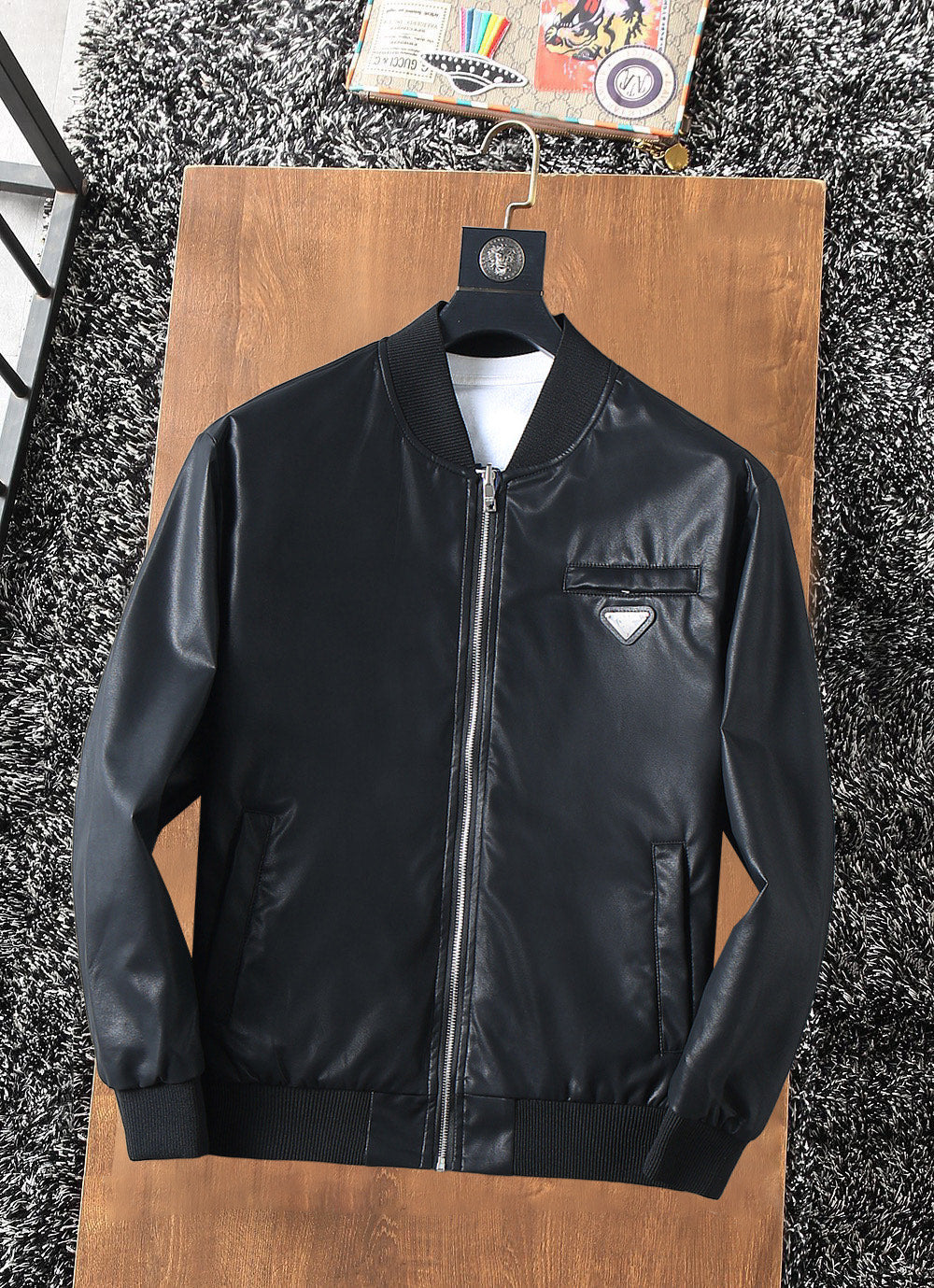 Prada black zip-up leather jacket with stand collar and front zipper