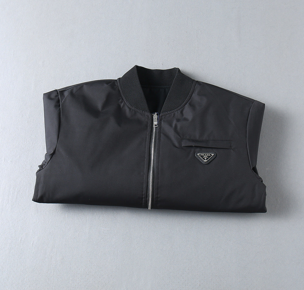 Prada sleeveless jacket with front zipper and chest logo patch