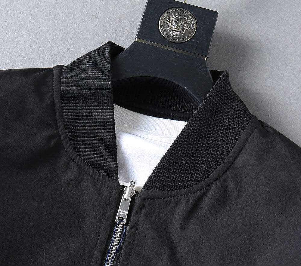 Prada sleeveless jacket neckline and front zipper detail