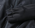 Prada long jacket sleeve seam with stitched panel and snap detail
