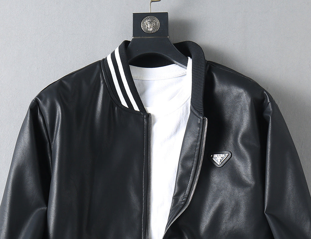 Black leather jacket front with stand collar, striped trim, zipper, and triangular logo