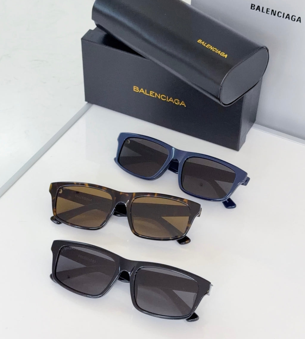 Sunglasses set of three pairs: tortoiseshell, blue, and black frames