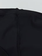 Black T-shirt back yoke seam with center stitched panel