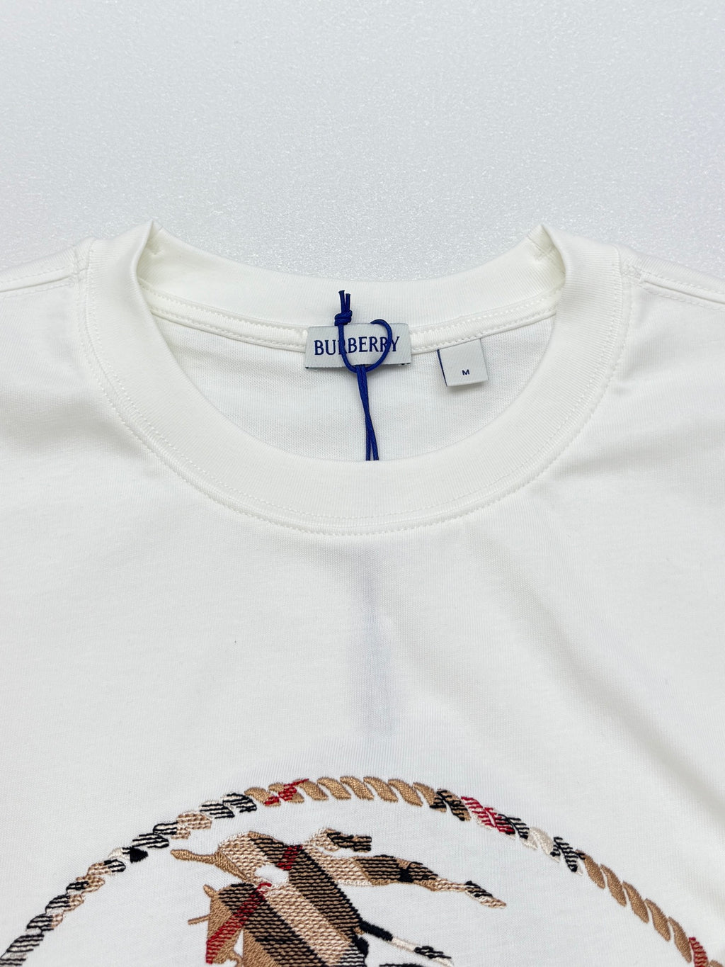 White short-sleeve T-shirt crew neck with Burberry neck label.