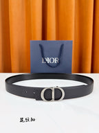 Dior belt in dark leather with silver CD buckle detail.