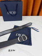 Dior belt laid flat in dark textured leather with silver-tone D buckle