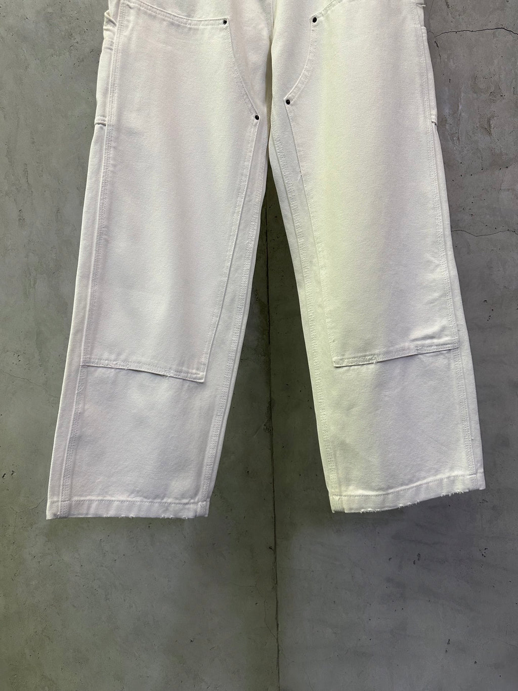 Prada white cargo pants with stitched panel seams and side pocket