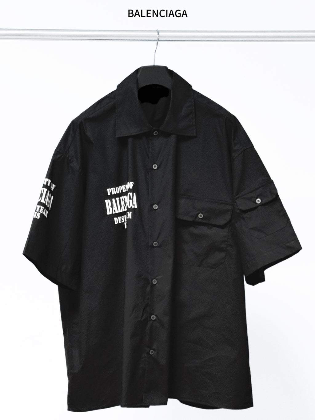 Balenciaga black short-sleeve button-up shirt with chest patch pocket and logo print