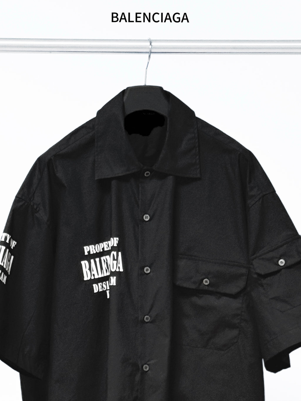 Balenciaga black short-sleeve button-up shirt with chest logo and pocket detail