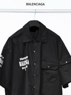Balenciaga black short-sleeve button-up shirt with chest logo and pocket detail