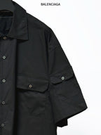 Balenciaga black short-sleeve shirt with front pocket panel and sleeve seam detail