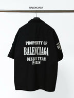 Balenciaga black short-sleeve shirt, back features large “PROPERTY OF BALENCIAGA” graphic