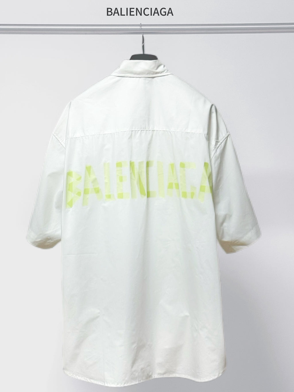 Balenciaga white short-sleeve button shirt with neon logo graphic on back