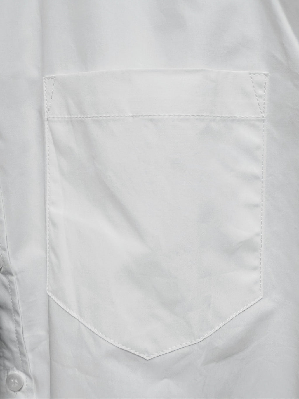 Balenciaga white shirt chest pocket detail with stitched edges