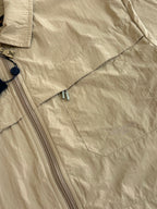 Beige Louis Vuitton jacket with zip front and small chest logo detail