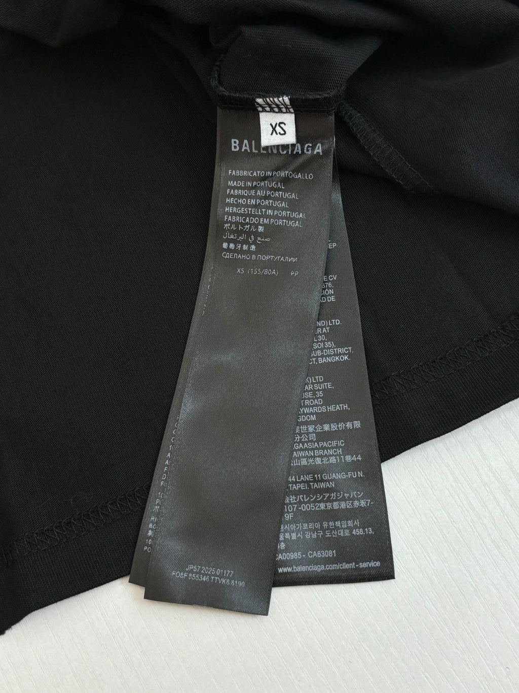 Balenciaga black T-shirt size XS tag with care and production text