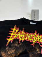 Balenciaga black T-shirt neon logo star graphic, close-up front
