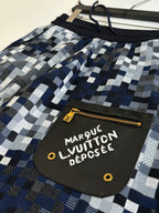 Louis Vuitton checkered shorts with front logo patch pocket and gold zipper trim