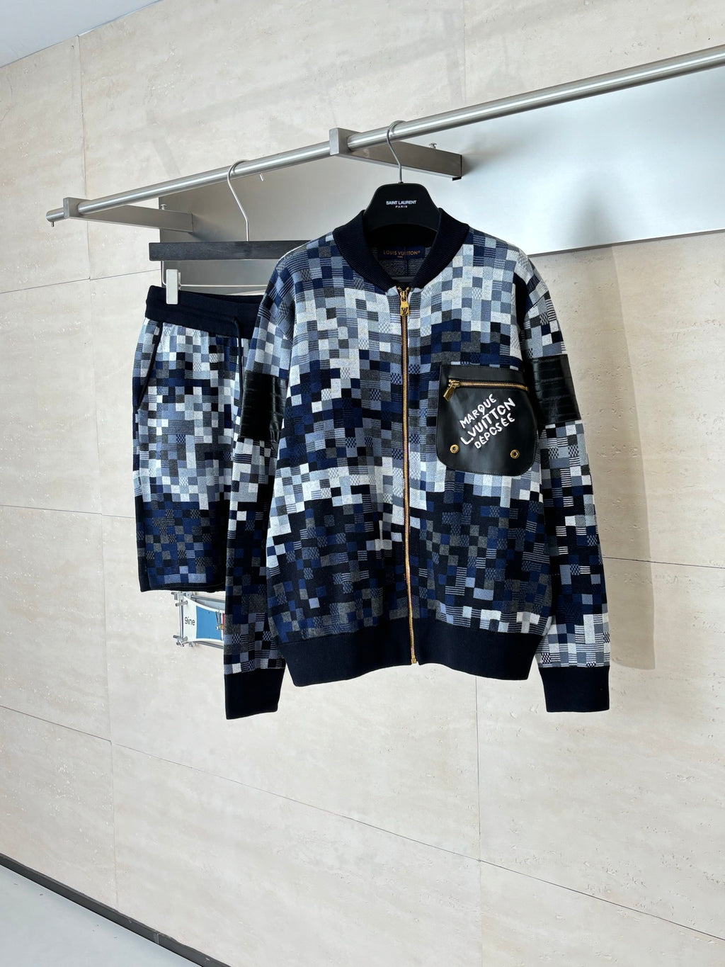Zip sweater jacket with blue pixel check knit and black ribbed hem and cuffs