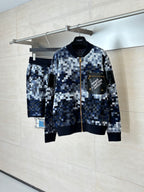 Zip sweater jacket with blue pixel check knit and black ribbed hem and cuffs