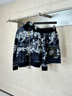 Louis Vuitton shorts set on hangers, check pattern with black waistband and label pocket