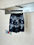 Louis Vuitton checkered shorts on hanger, dark blue and gray with elastic waistband