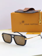 Louis Vuitton sunglasses with black frames and tan monogram lenses