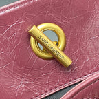 Gold padlock-style charm with SAINT LAURENT PARIS engraving on burgundy leather