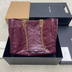 Burgundy quilted leather tote bag with gold chain straps and center YSL logo