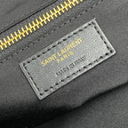 SAINT LAURENT PARIS fabric label with MADE IN ITALY text on black textile