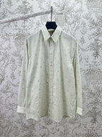Light blue striped button-up shirt with pointed collar and button placket