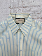 Light blue striped button-up shirt with spread collar and Gucci neck label