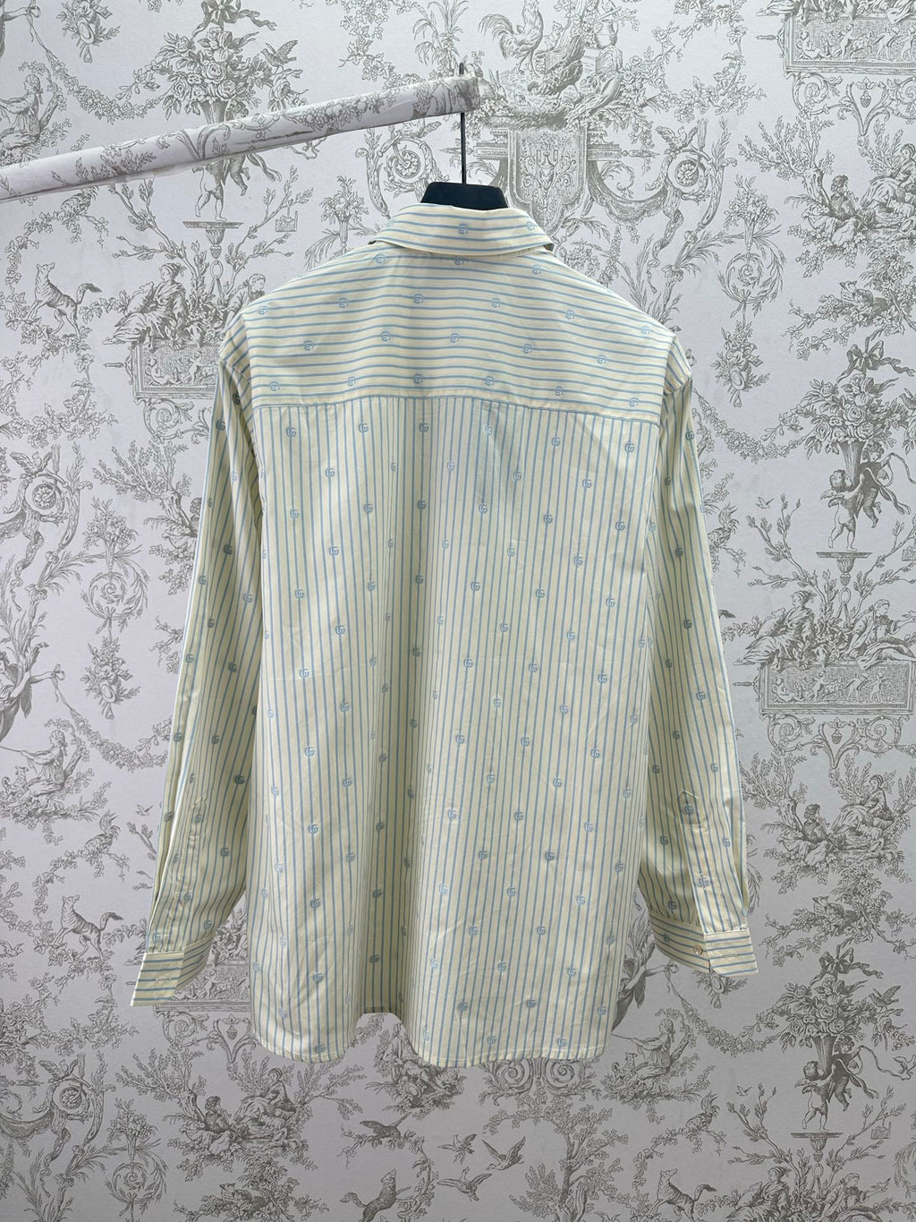 Light blue striped long-sleeve shirt with pointed collar and button back yoke