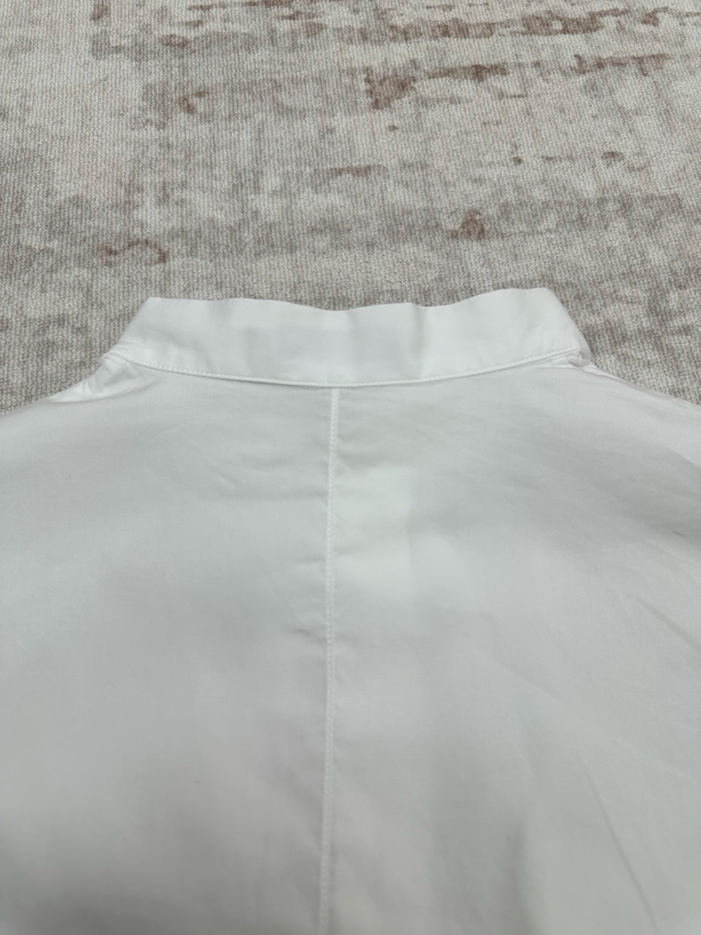 White shirt back with yoke seam and center back panel