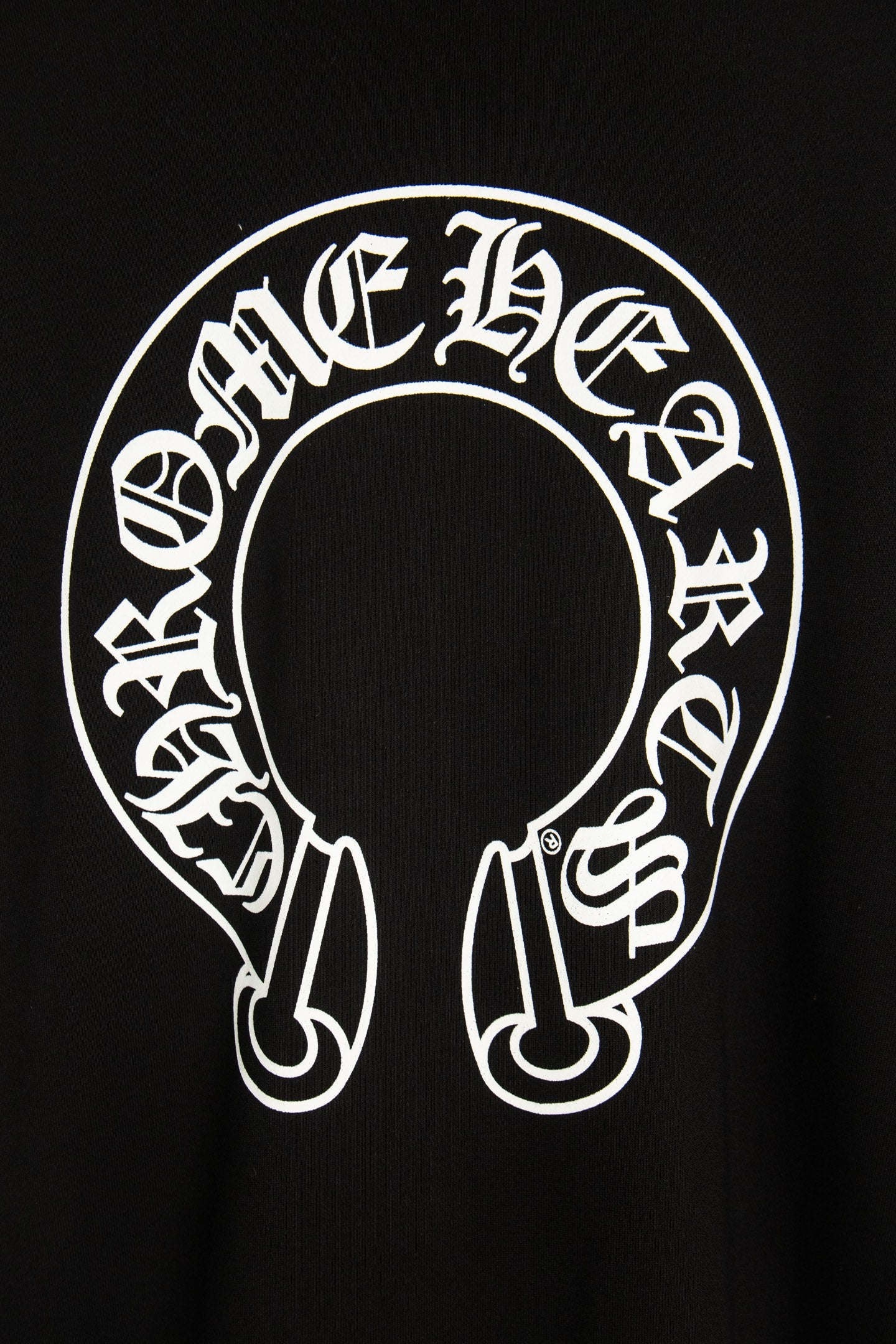 Black hoodie chest graphic with large oval/circular white logo