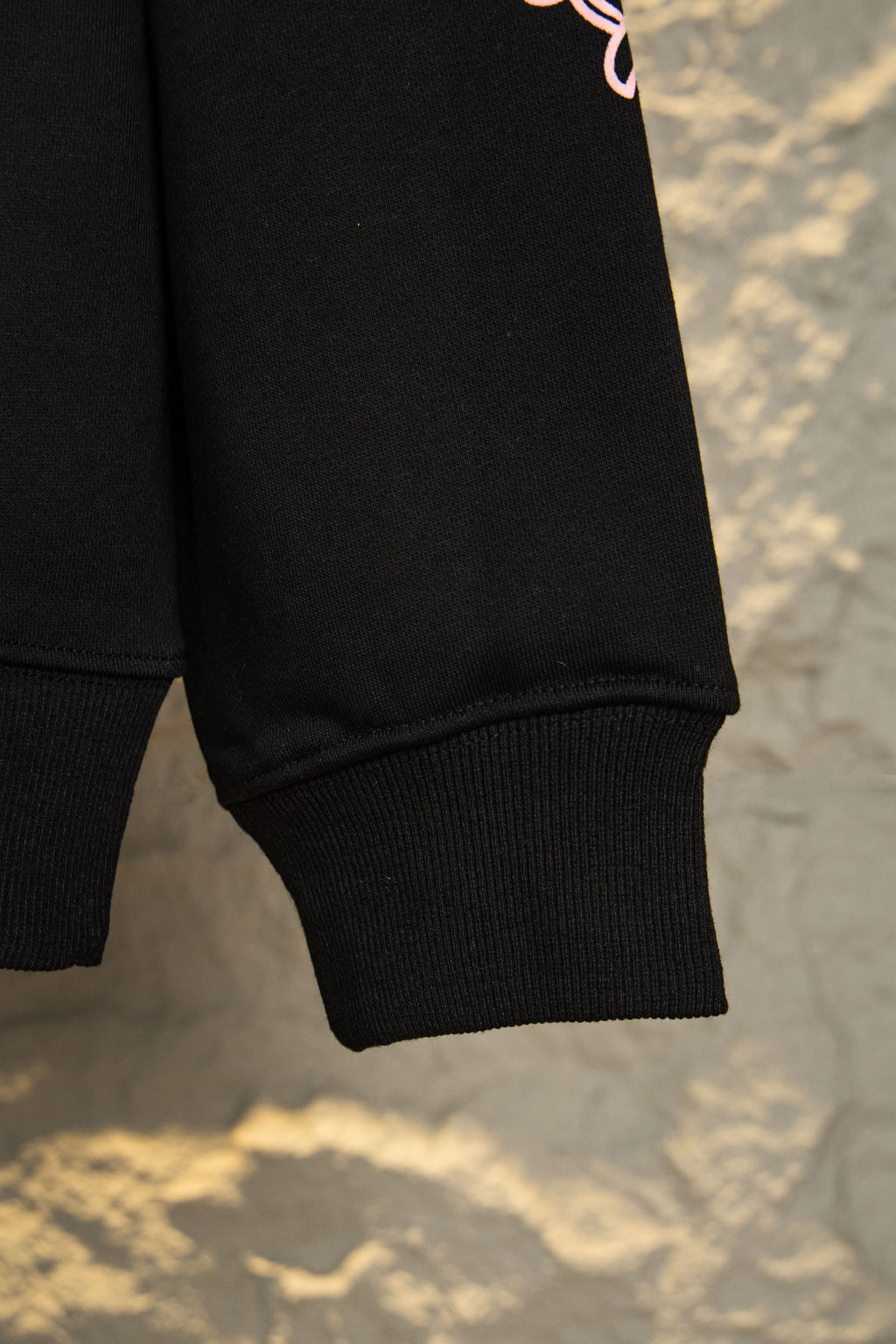 Black hoodie ribbed sleeve cuff