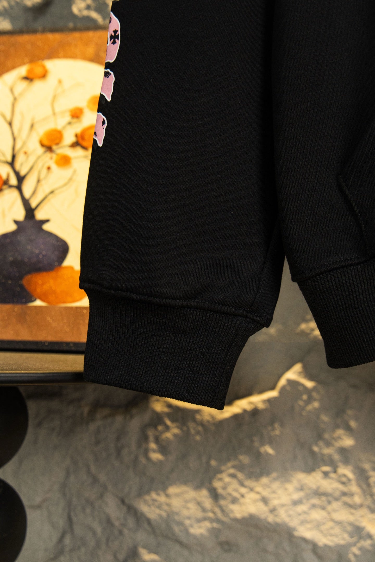 Black hoodie sleeve cuff and pocket