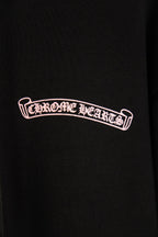 Black hoodie with small outlined logo print on left chest.