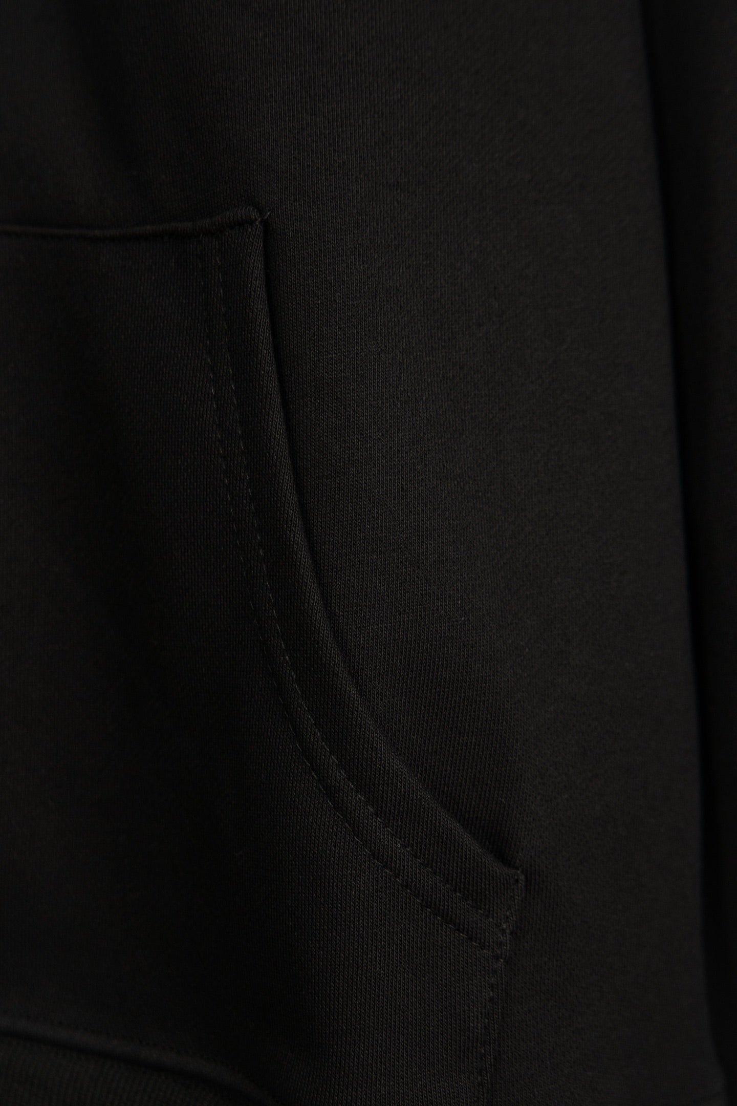 Black hoodie sleeve seam and ribbed cuff