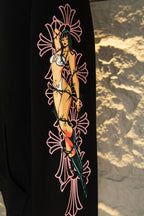 Black hoodie with full-length colorful woman illustration and floral line art.