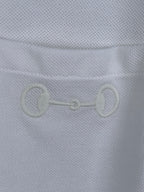 Gucci white T-shirt fabric close-up with embroidered chain-link logo
