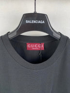 Dark crew-neck T-shirt with Gucci neck label