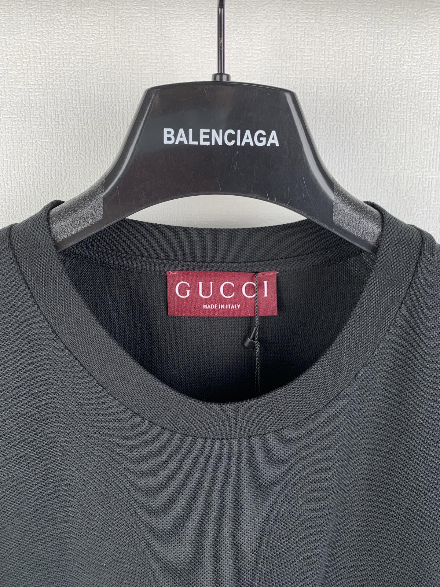 Dark crew-neck T-shirt with Gucci neck label