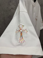 White short-sleeve T-shirt with embroidered cross at lower front hem