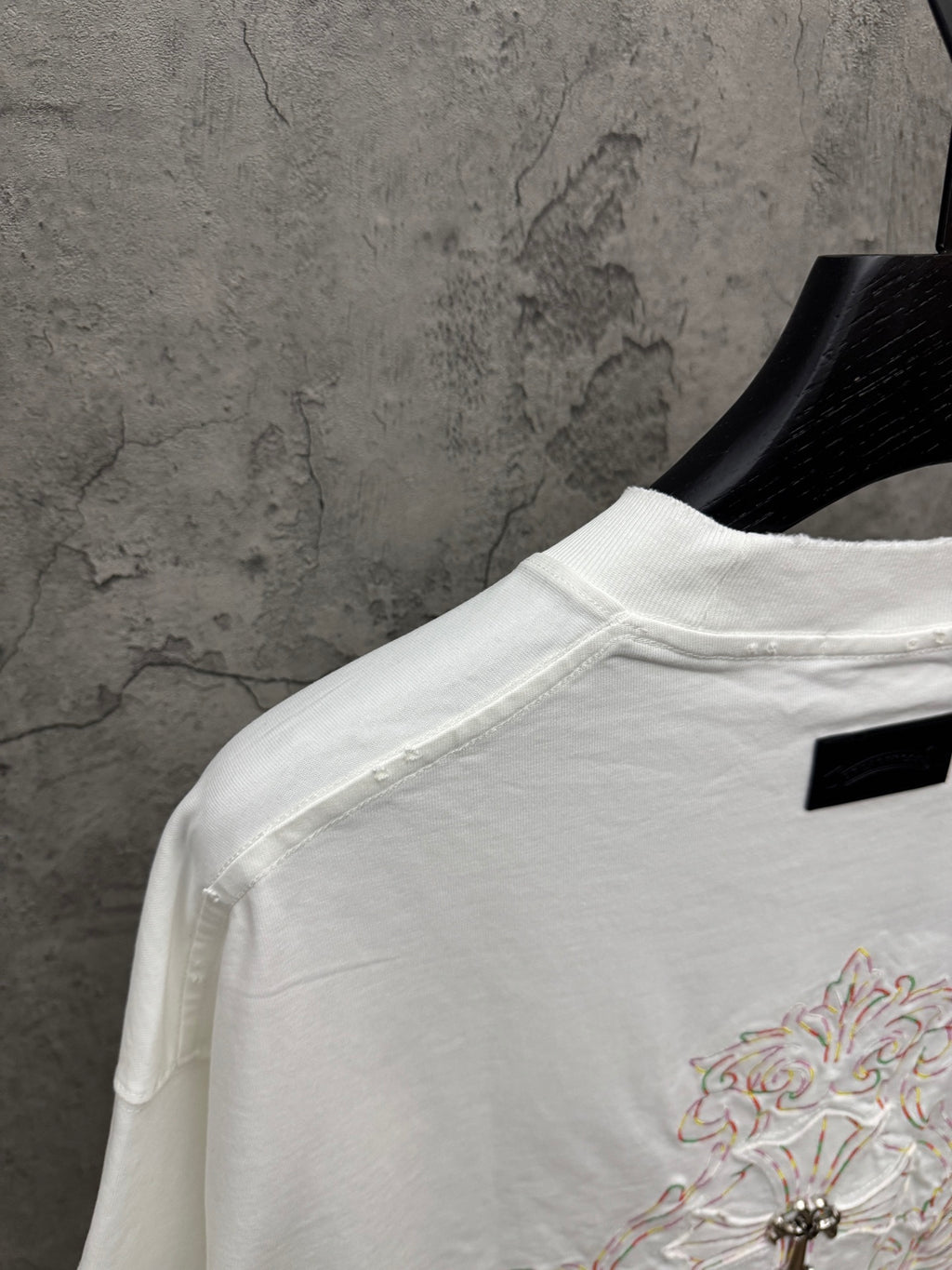 White short-sleeve T-shirt back view with small chest embroidery and black neck label